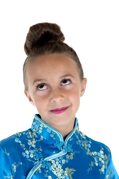 Porträt eines jungen Mädchens in orientalischem Kleid, das nach oben schaut — Stockfoto