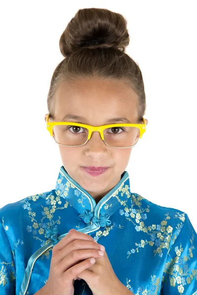 Cute girl wearing Chinese dress and yellow glasses — Stock Photo, Image