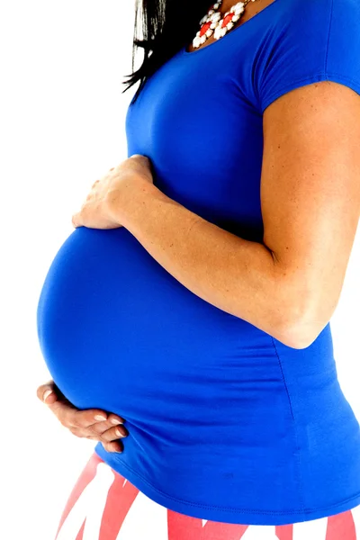 Närbild av en gravid mamma klädd i en blå topp — Stockfoto