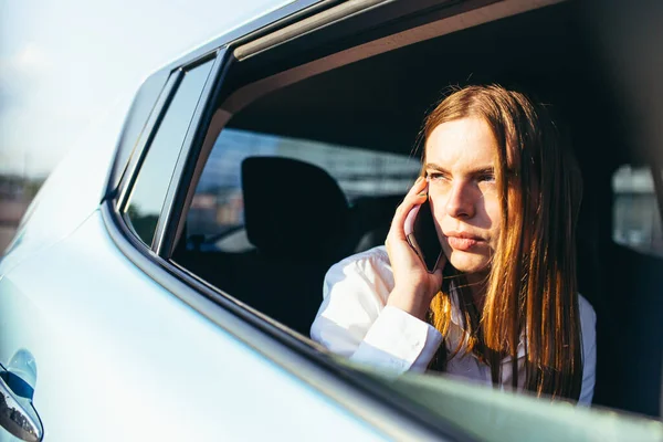 Beautiful Female Car Passenger Looks Out Window Talks Phone Close — Stock Photo, Image