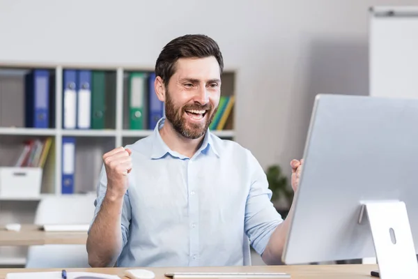 Successful Freelancer Looks Computer Screen Rejoices Celebrates Success Gesture Triumph — Foto de Stock