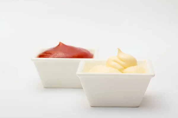 Ketchup and mayonnaise on white background — Stock Photo, Image