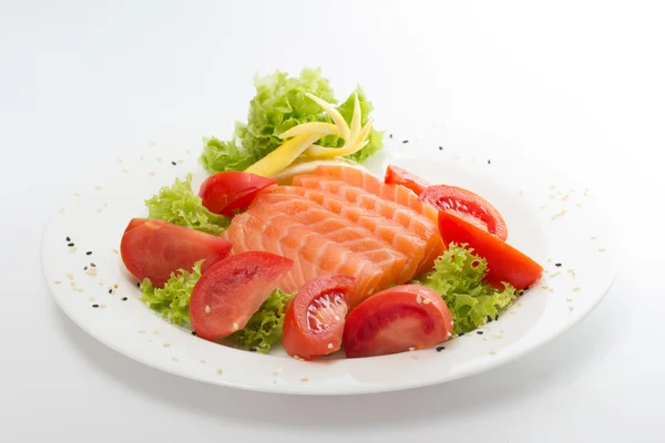 Raw salmon fillet on sticks with vegetables — Stock Photo, Image