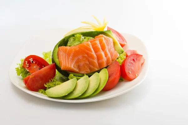 Filete de salmón crudo en palitos con verduras —  Fotos de Stock