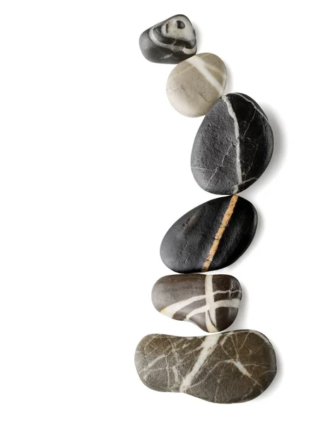 커브에 배열 된 백색 줄무늬를 가진 돌 — 스톡 사진
