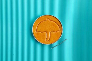 Korean Dalgona honeycomb sugar cookie with umbrella shape to play new trend candy challenge clipart