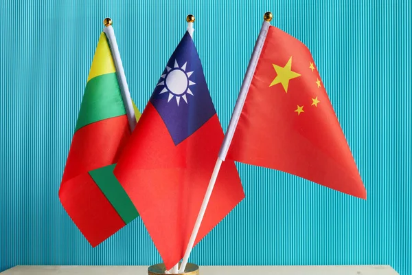 Taiwan, Lithuanian and Chinese Flags on aqua background — Stock Photo, Image