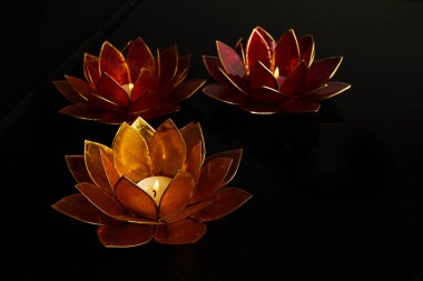 Happy Vesak Day Buddha Purnima Background. Candles during Vesak day celebration.