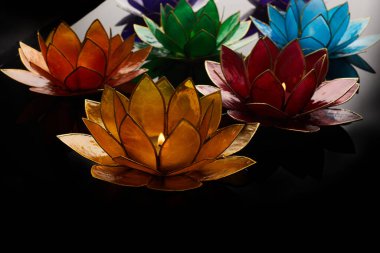 Happy Vesak Day Buddha Purnima Background. Candles during Vesak day celebration.