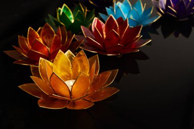 Happy Vesak Day Buddha Purnima Background. Candles during Vesak day celebration.