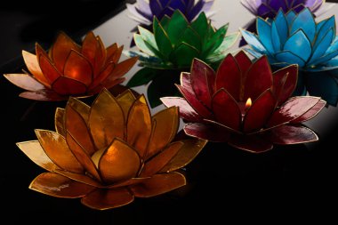 Happy Vesak Day Buddha Purnima Background. Candles during Vesak day celebration.