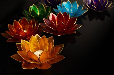 Happy Vesak Day Buddha Purnima Background. Candles during Vesak day celebration.