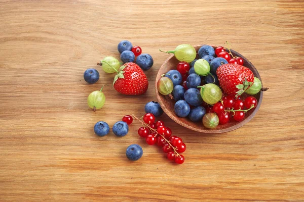 Berries Mix Heart Shaped Bowl Spilled Rustic Wooden Table — Stock Photo, Image