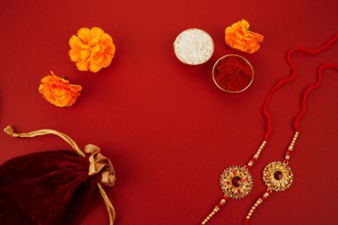 Indian festival Raksha Bandhan with wrist band Rakhi, Rice Grains and Kumkum