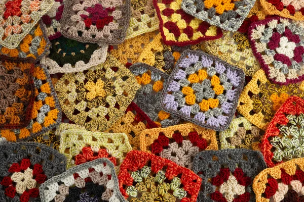 Granny squares. Colored wool knitting crocheting.