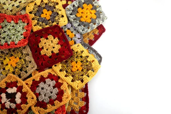 Granny squares. Colored wool knitting crocheting.