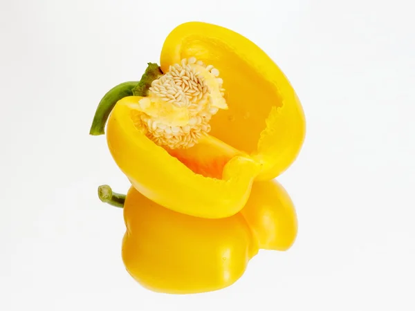 Yellow pepper incision on the mirror — Stock Photo, Image