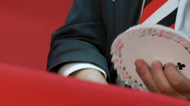 Playing cards in hands — Stock Video