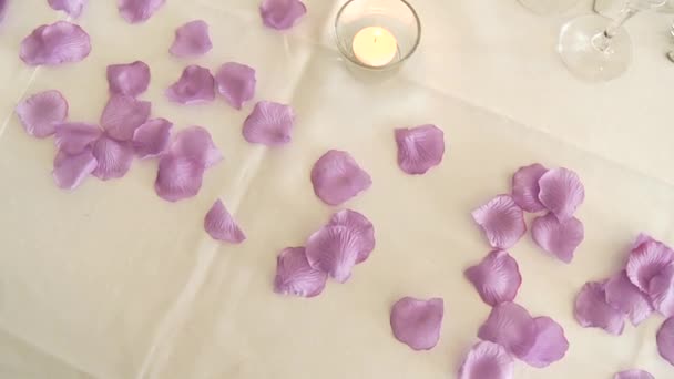 Table decoration with petals — Stock Video