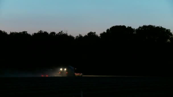 Combine harvester at night — Stock Video