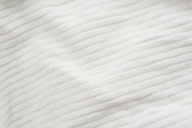 Beyaz kadife kumaş dokusu yakın.