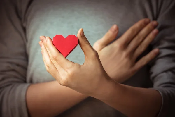 Hearts in hand — Stock Photo, Image