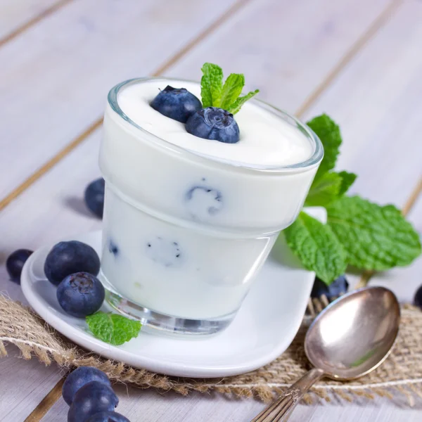 Yogurt with blueberries Stock Image