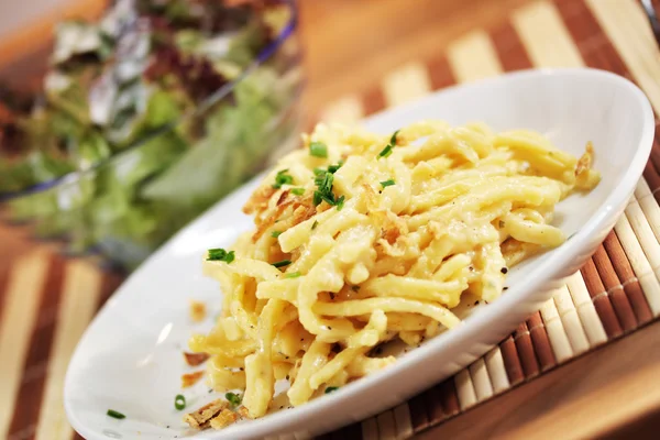Noodles with cheese — Stock Photo, Image