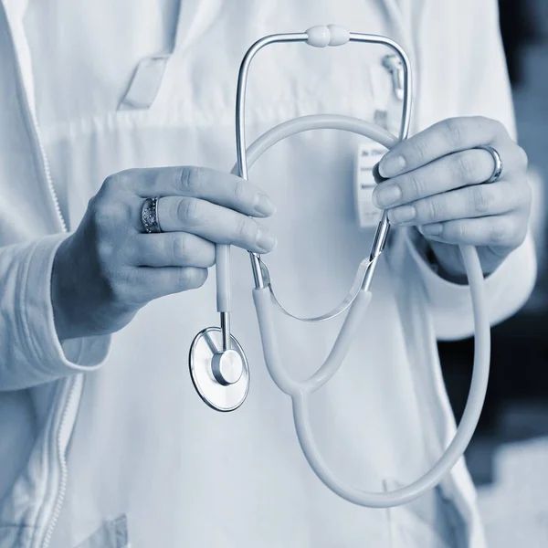 Female Doctor Holding Stethoscope Concept Health Medicine Hospital Background — Stock Photo, Image