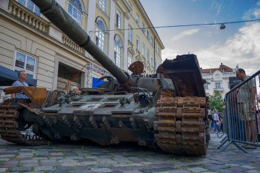 Lviv, Ukraine  August 11. 2022 : Exhibition of destroyed Russian armored vehicles near the City Hall in the city Lviv, Ukraine.