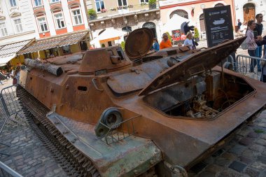 Lviv, Ukraine  August 11. 2022 : Exhibition of destroyed Russian armored vehicles near the City Hall in the city Lviv, Ukraine.