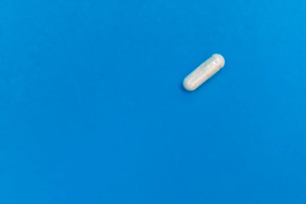 Multicolore Pillole Texture Sfondo Blu — Foto Stock