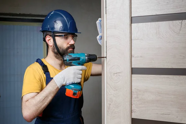 Worker Drill Orange Helmet Installs Door House — Stock Photo, Image