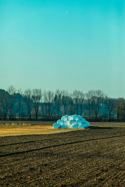 Pile Plastic Wrapped Hay Bales Plowed Field German Countryside Stock Image