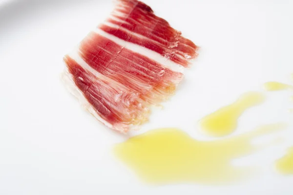 Loncha de Jamón Ibérico con aceite — Stock fotografie