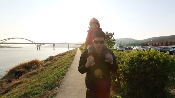 Baby At Uncles Shoulders. — Stock Video