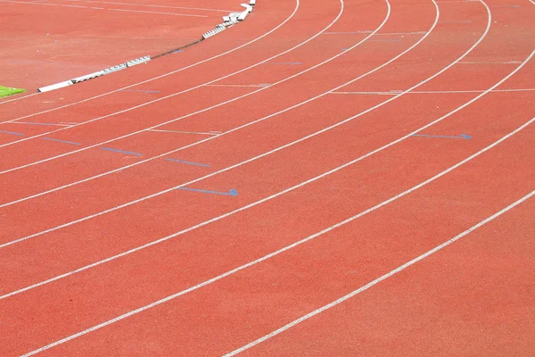 Curva di una pista rossa — Foto Stock