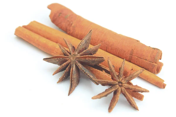 Cinnamon sticks and anise stars — Stock Photo, Image