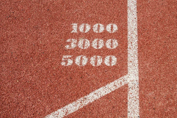 Unmbers em chão de estádio — Fotografia de Stock