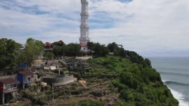 Aerial view of the lighthouse in Indonesian beach