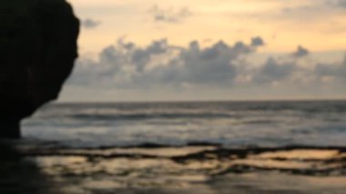 Blurry view of sunset ocean for background in beach Indonesia