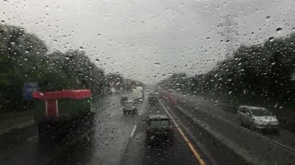 Blurry Car Front View Driving Highway Rain Hail Indonesia — 图库视频影像