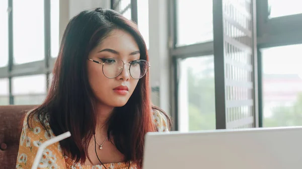 Young Asian Woman Working Laptop Computer While Sitting Cafe Looking — Stock Photo, Image