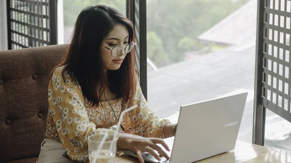 Young Asian Woman Working Laptop Computer While Sitting Cafe Looking — Stock Photo, Image