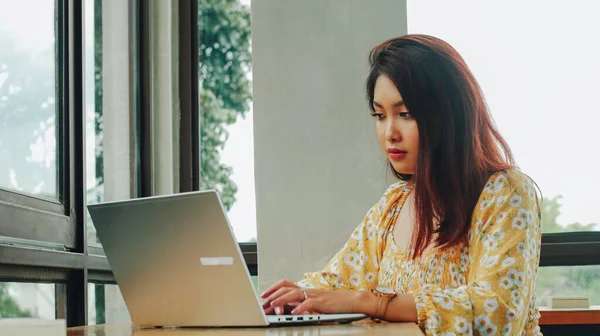 Young Asian Woman Working Laptop Computer While Sitting Cafe Looking — Stock Photo, Image