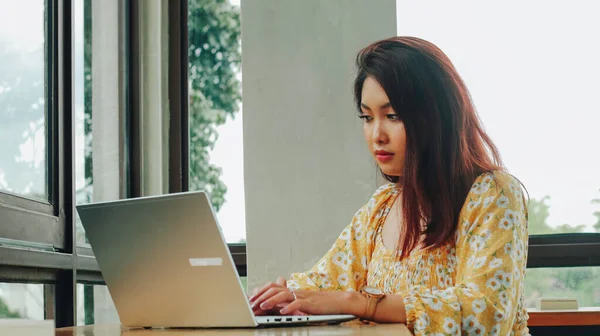 Young Asian Woman Working Laptop Computer While Sitting Cafe Looking — Stock Photo, Image