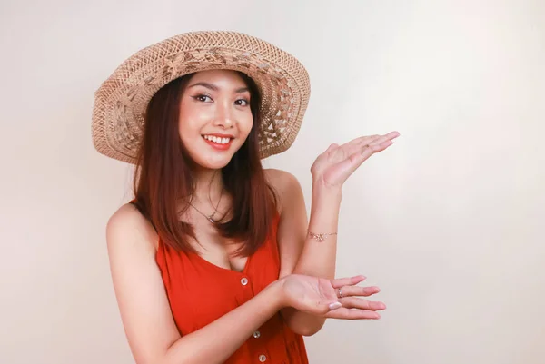 Smiling Beautiful Asian Woman Pointing Finger Sideward Empty Space Studio —  Fotos de Stock