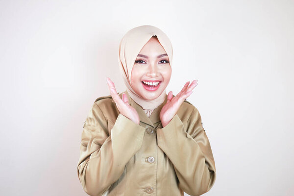 Portrait Young Asian Muslim Woman Wearing Brown Uniform Hijab Smiling Stock Photo