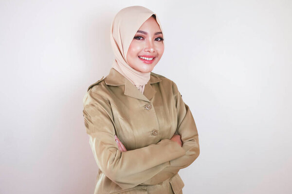 Portrait Young Asian Muslim Woman Wearing Brown Uniform Hijab Smiling Stock Image