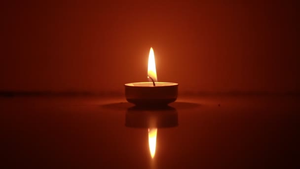 Two Candles Light Burning Brightly Black Background — Vídeos de Stock